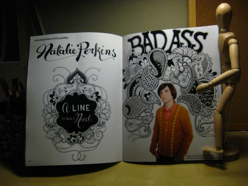 Photo of open Eat Sleep Draw magazine, on the left page is "A line is all I need" and on the right page is my "Bad Ass" illustration