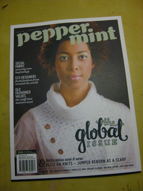 Cover of Peppermint Magazine featuring a short haired, brown skinned woman wearing a white turtleneck top. My hand lettering is in the corner, it says "the global issue".