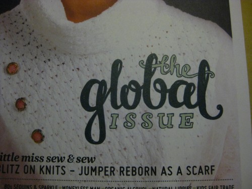 Detailed shot of my lettering saying "the global issue" on the front of Peppermint.