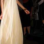 Detail of model's skirt - long white and flowing.