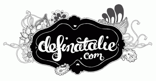 I've drawn a banner for my blog in black and grey, with a large badge saying 'definatalie.com' and paisley behind it.