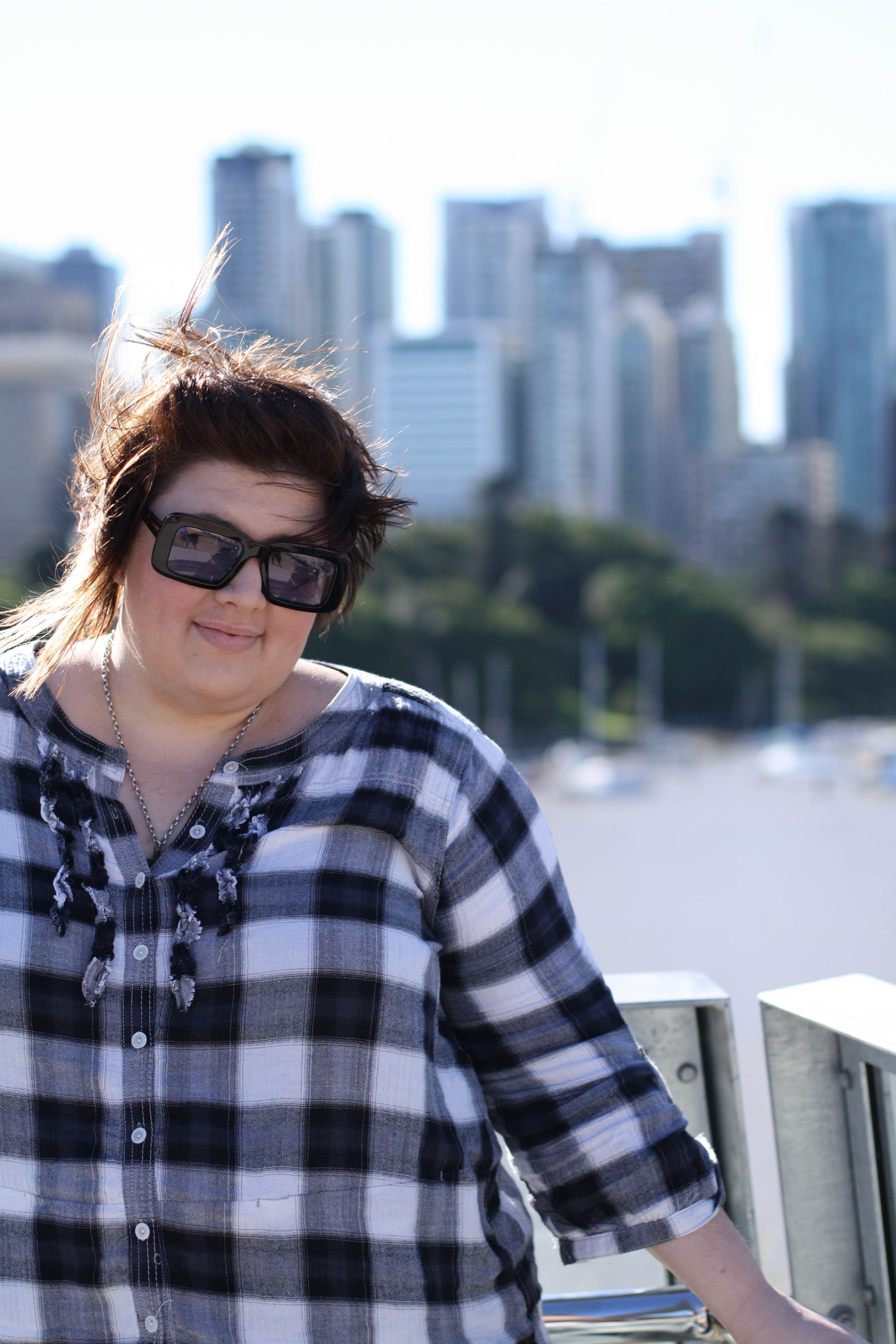 Photo of me with the CBD in the background - my hair is very windswept!