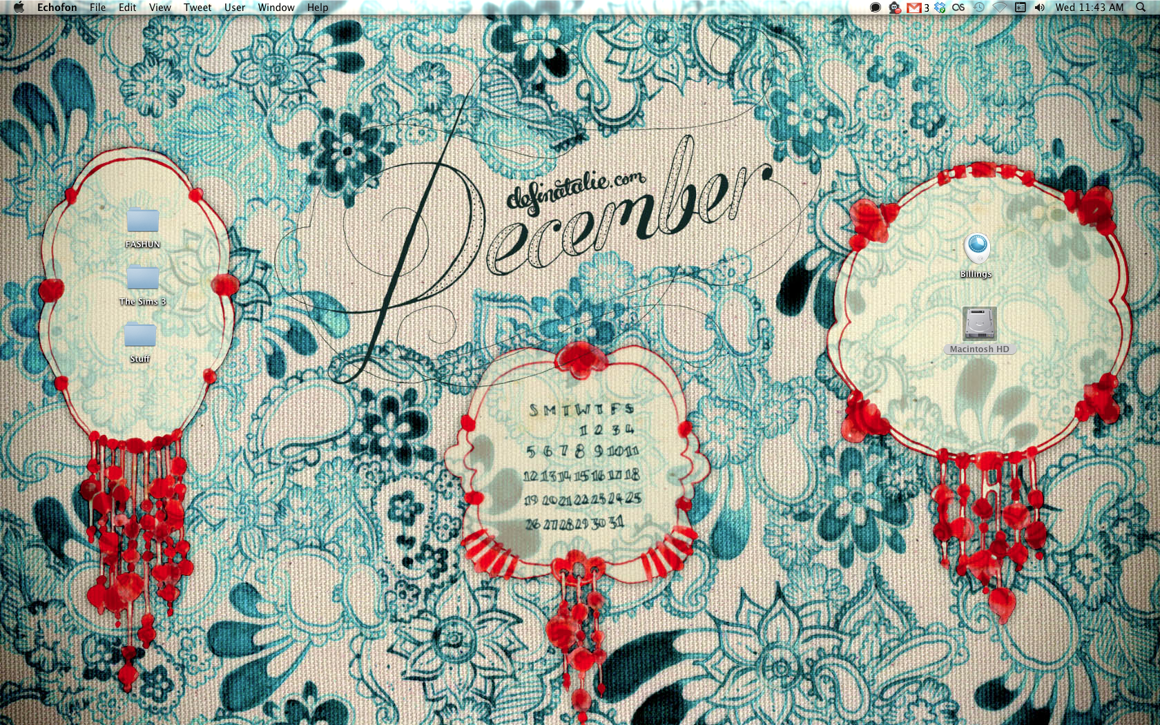 A computer wallpaper with paisley doodling all over the background in turquoise ink with three choral inked shapes (for holding icons) and a fancy "December" written in the middle.