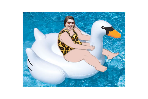 Photoshopped image of me on a large inflatable swan in a pool.