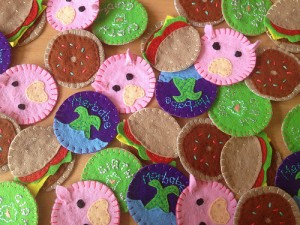 Five different designs of hand embroidered Girth Guide badges are now available: GG emblem, donut, pig, merbabe and burger.