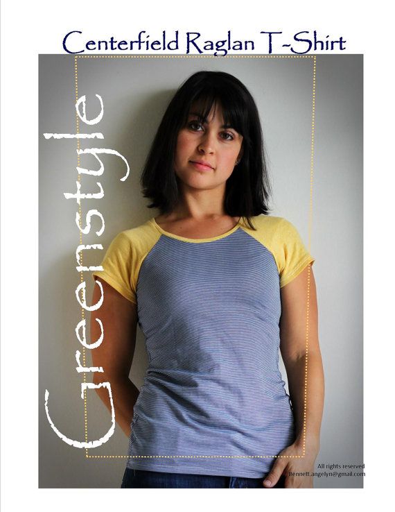 The model wears this grey raglan tee with contrasting yellow sleeves and neck binding.