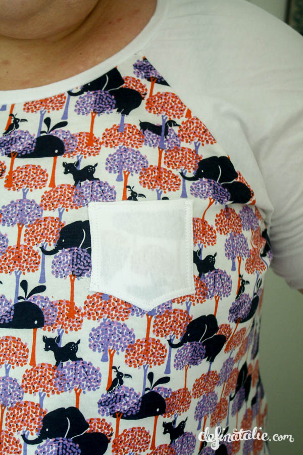 Check out this cute pocket! Why is there a whale in the forest, hanging out with deers, elephants and a dachshund? 