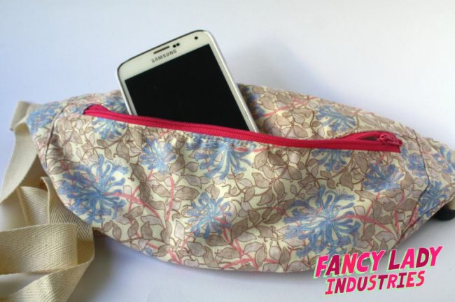 This bumbag uses a William Morris print in pastel pinks, creams and blues. I adore it! I've popped my beat up Samsung s5 in the bag to show scale. These bags will fit your phone, keys and a little purse.