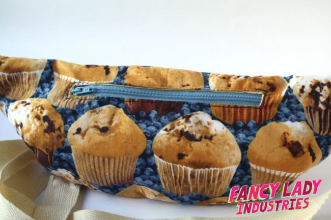 The rear view of my Muffin print bumbag features a zippered pocket for stashing important things.