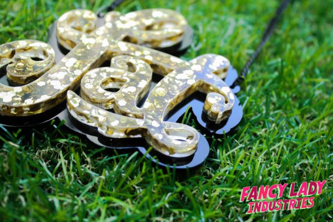 Currently out of stock, but new gold glitter fat necklaces coming soon!